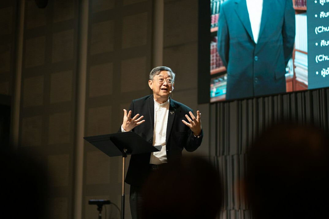 person speaking confidently on stage
