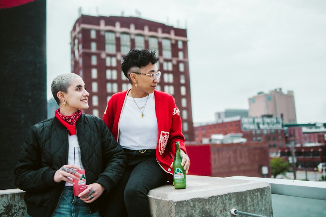 Two people having a friendly conversation outdoors
