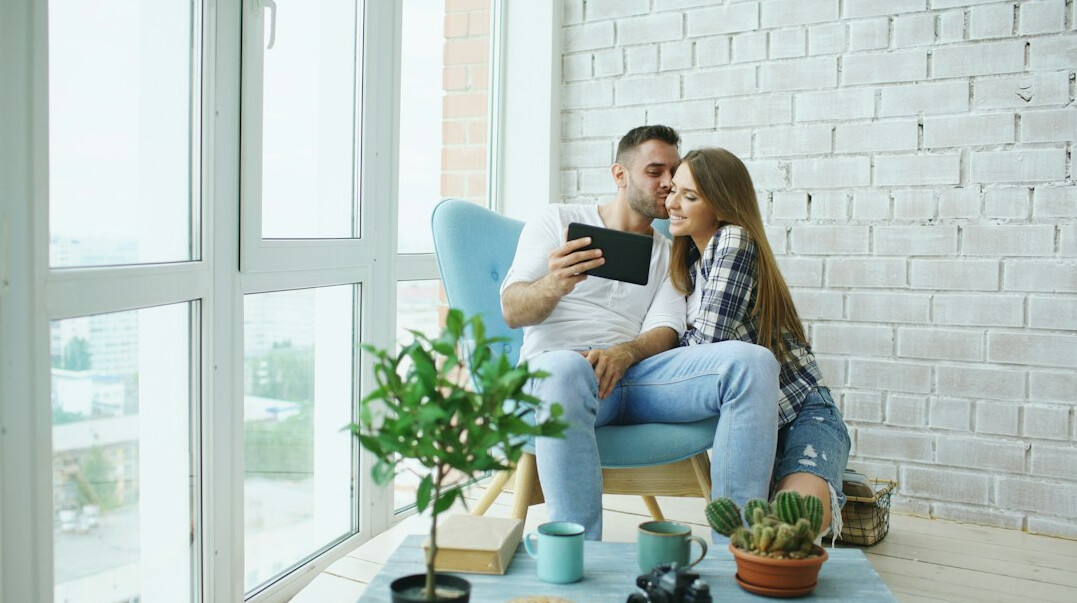couple talking on couch