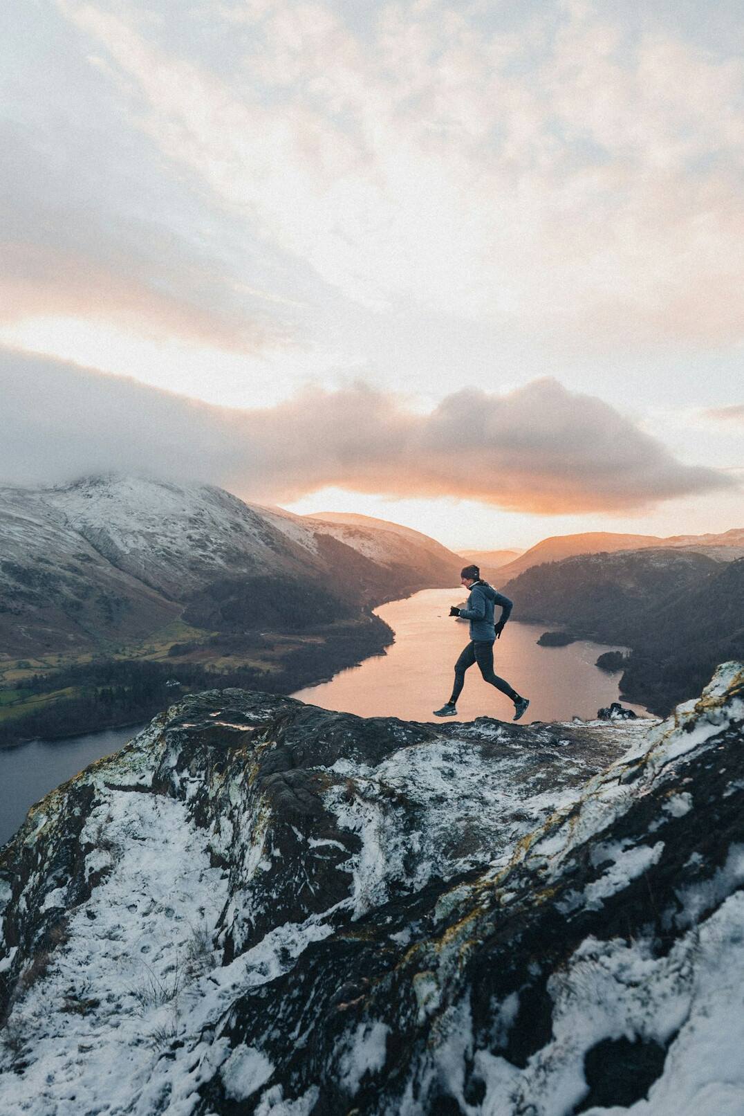 person climbing mountain